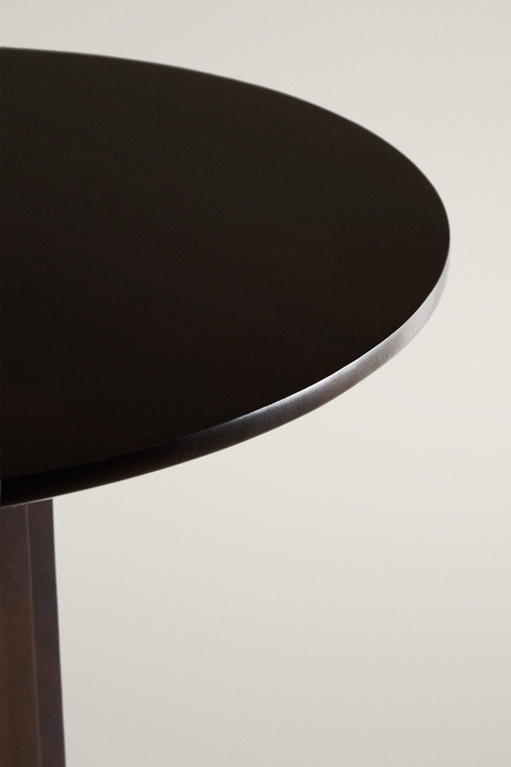 ROUND BEDSIDE TABLE