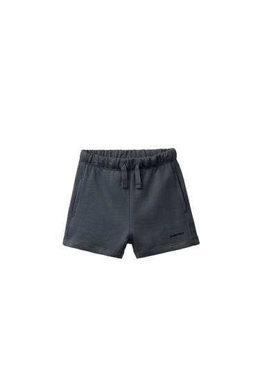 TEXT PRINT PLUSH BERMUDA SHORTS