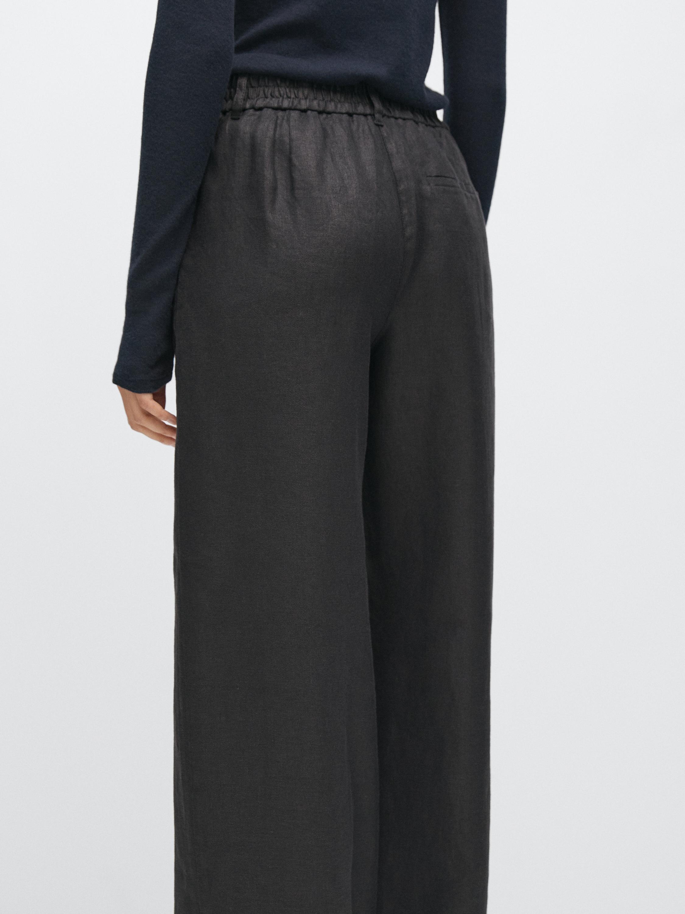 100% linen wide-leg elasticated trousers