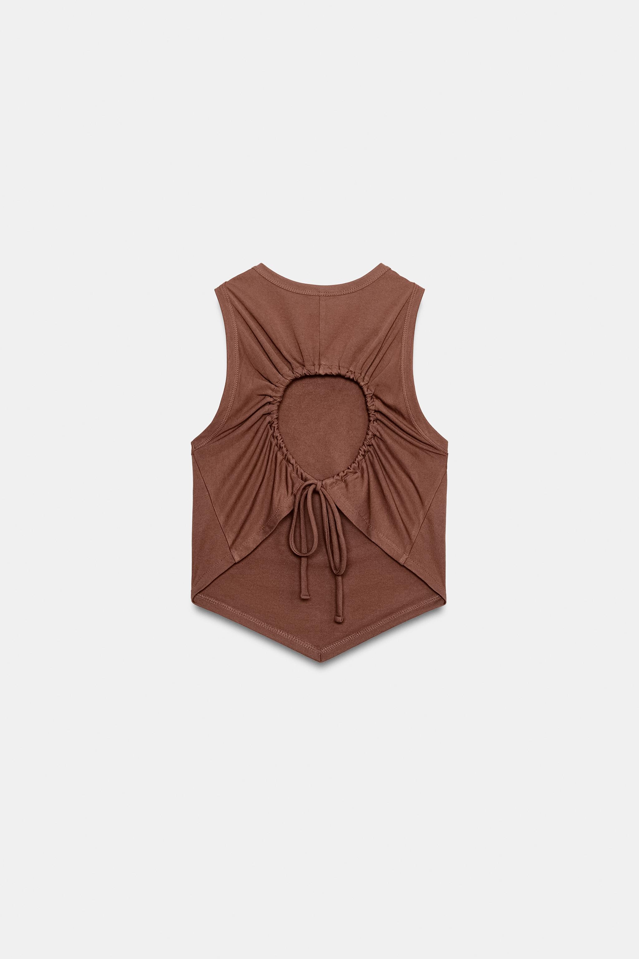 FLOWY TOP WITH BACK OPENING