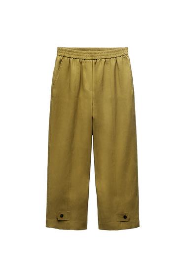 CARROT FIT TROUSERS WITH TABS AT HEM