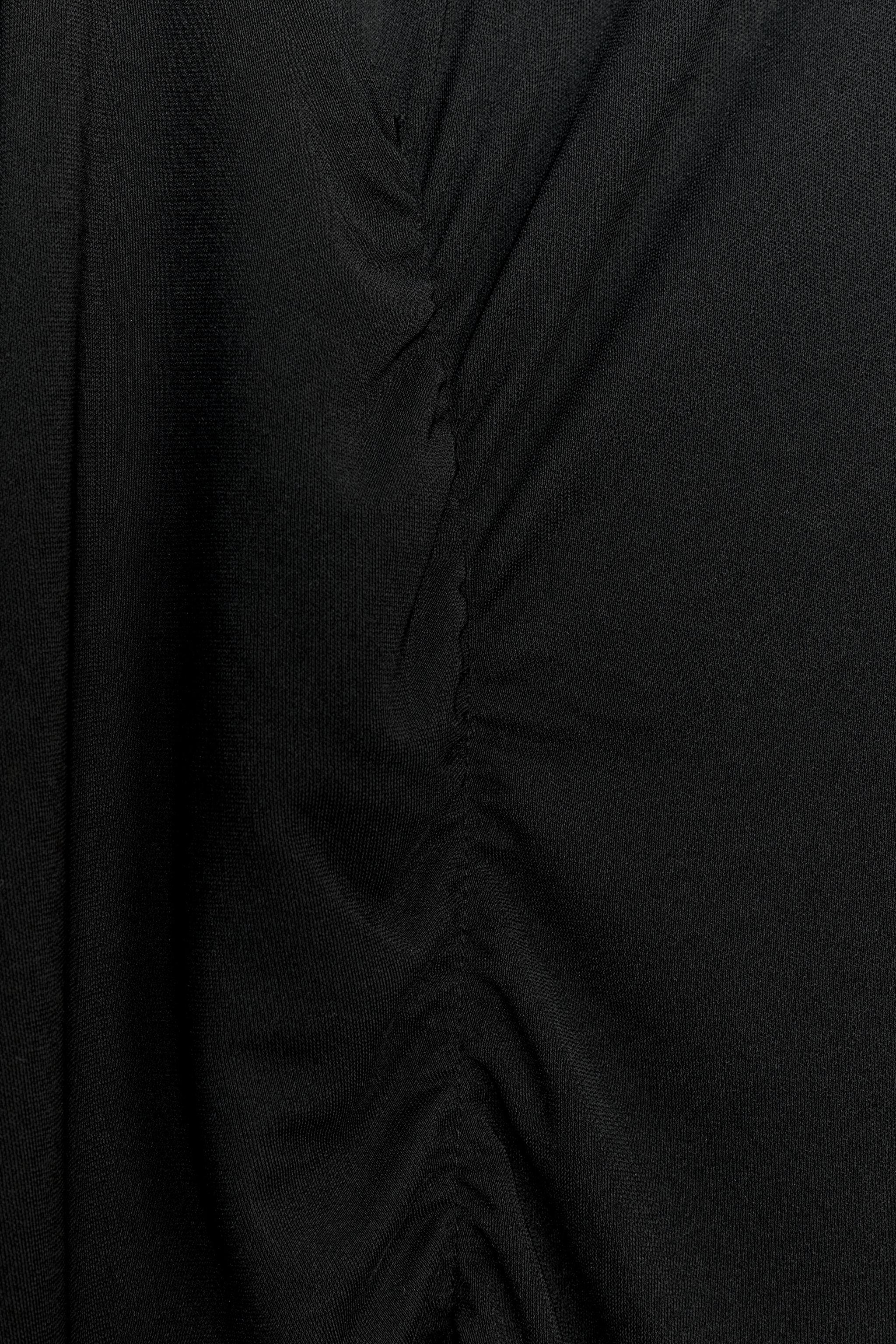 ASYMMETRIC SLEEVE DRESS LIMITED EDITION