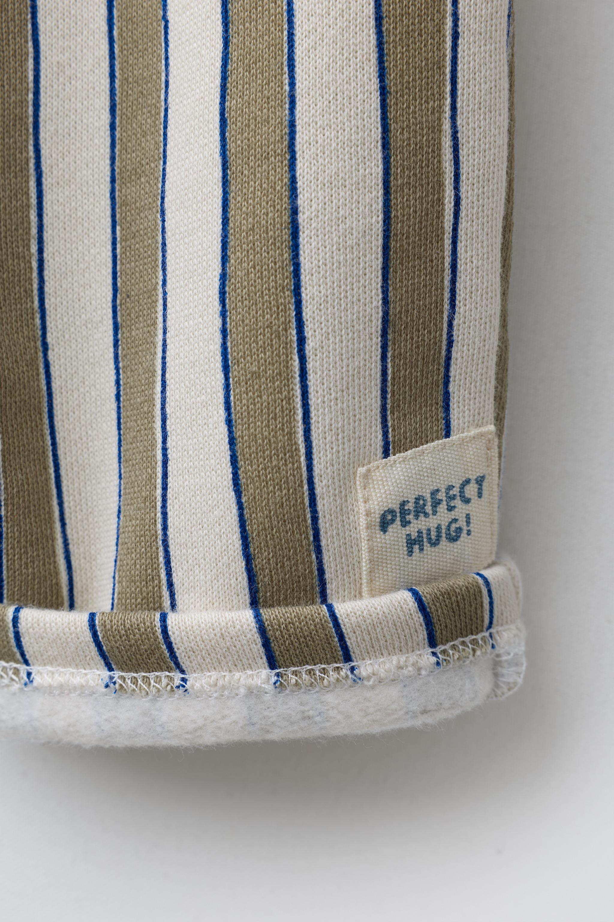 STRIPED BAGGY PANTS WITH LABEL