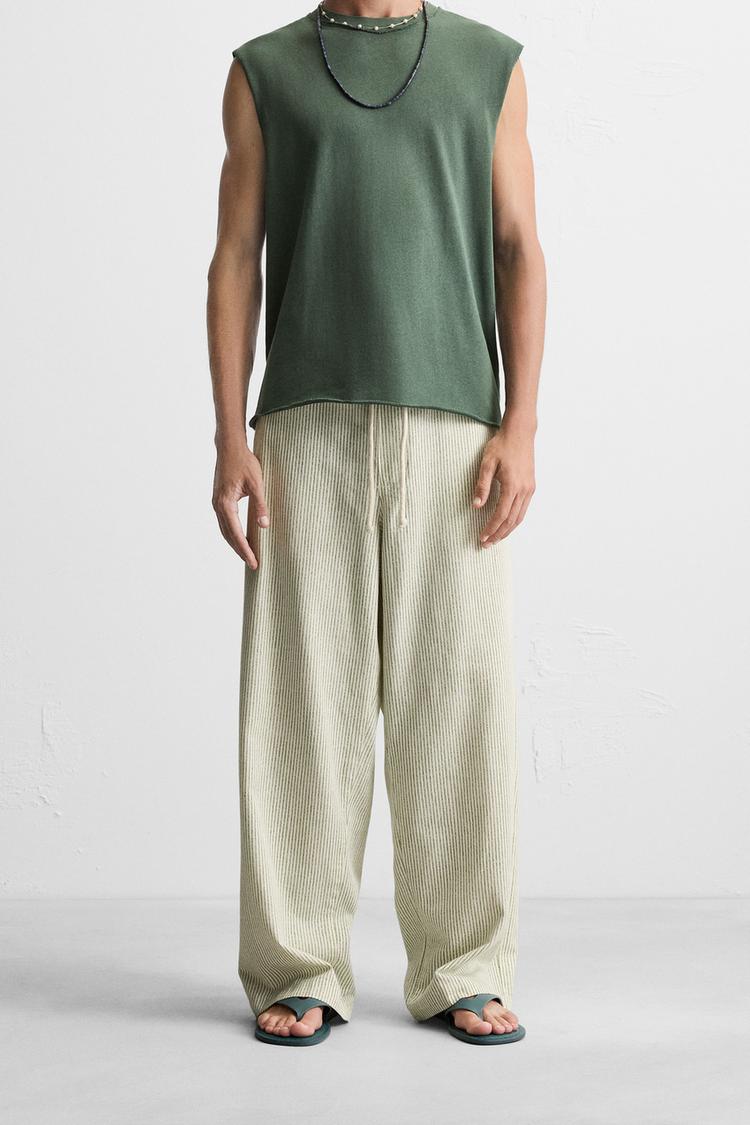 STRIPED BAGGY FIT PANTS