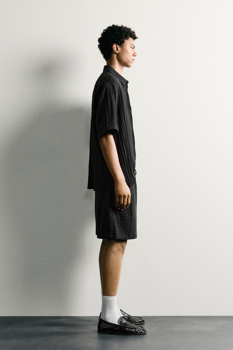 BERMUDA RELAXED FIT CON TEXTURA 4