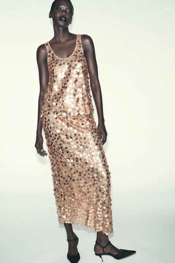 FALDA MIDI ASIMÉTRICA LENTEJUELAS - oro rosa de Zara - Imagen 0