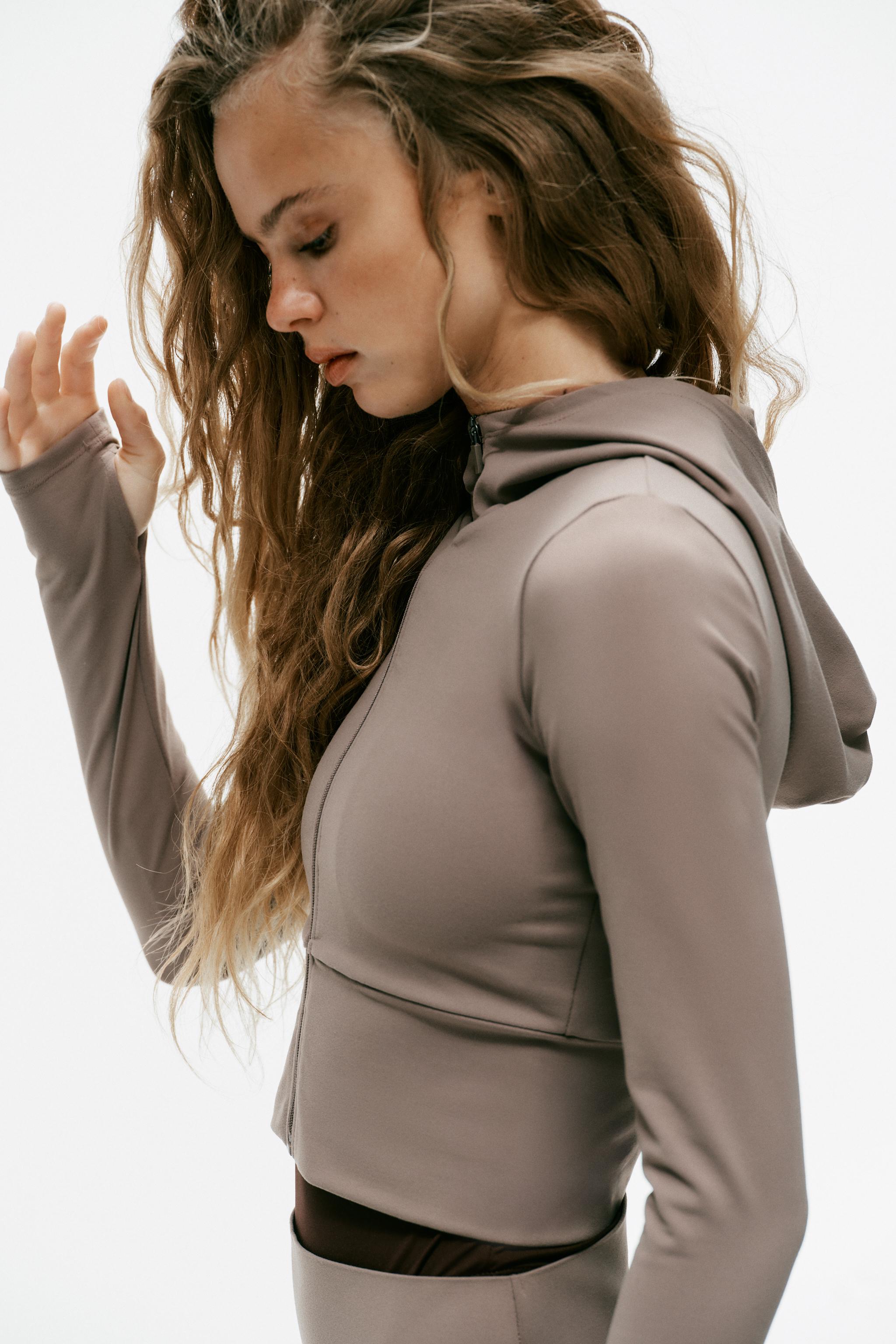 VESTE STRETCH CAPUCHE ZIP