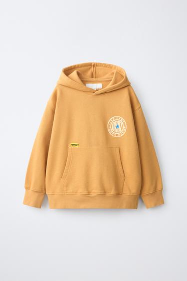 LOGO PRINT HOODIE — Mustard 2