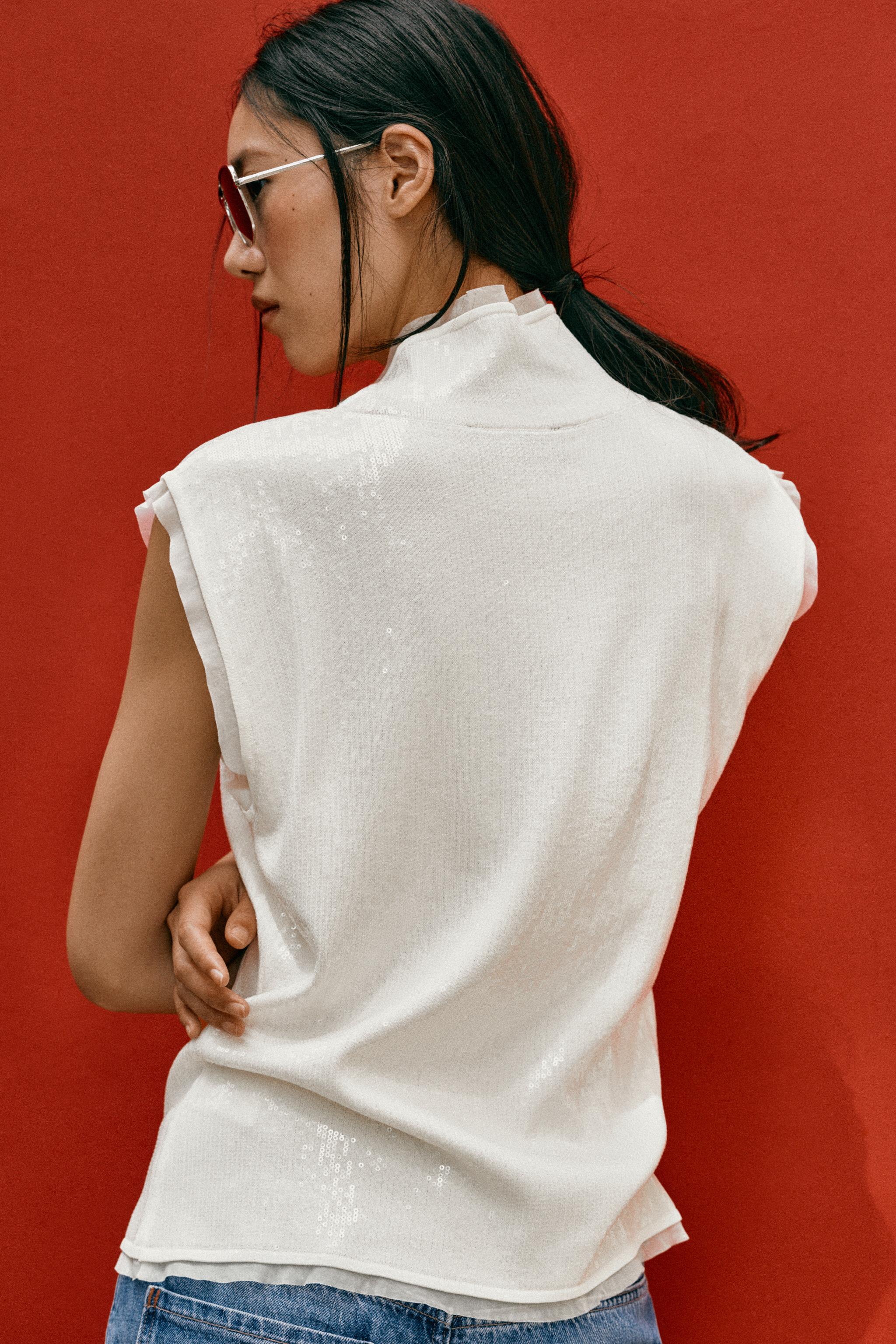 TOP EN MAILLE À PAILLETTES