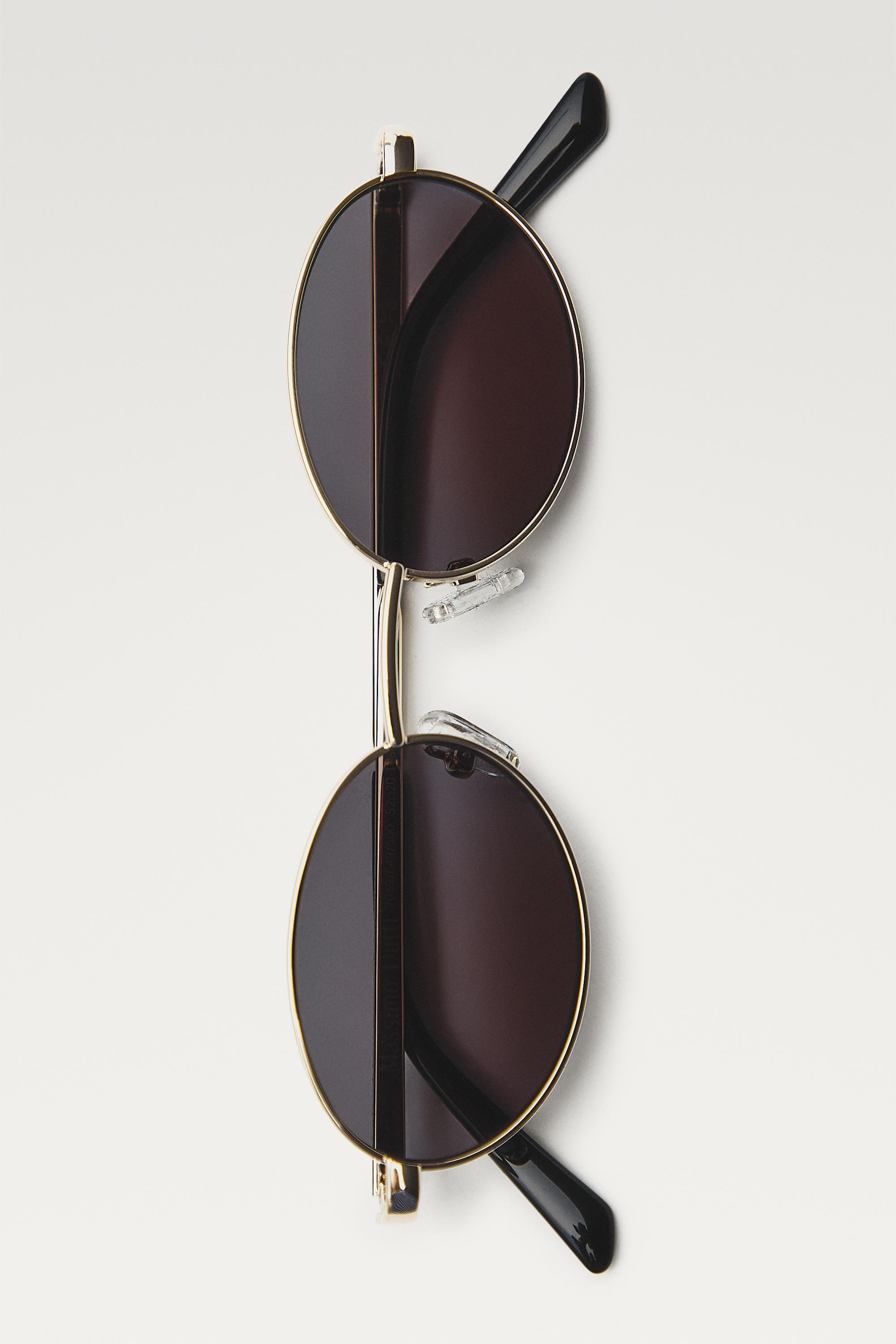 Metallic oval sunglasses — Green