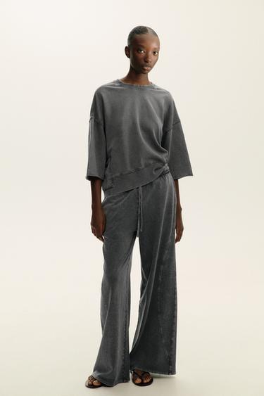 PANTALÓN EFECTO LAVADO - Gris oscuro de Zara - Imagen 0