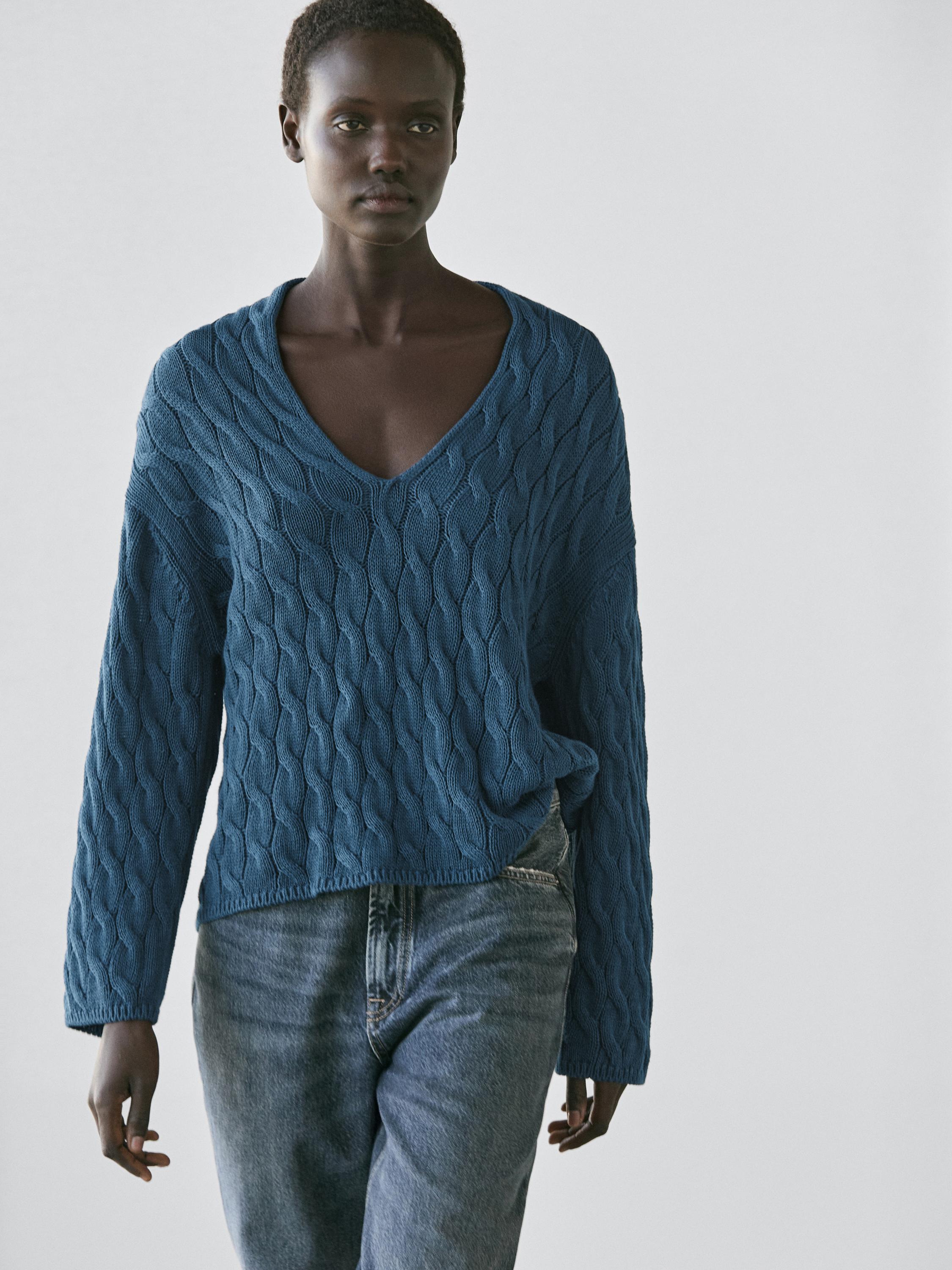 Cotton blend knit sweater with knot details
