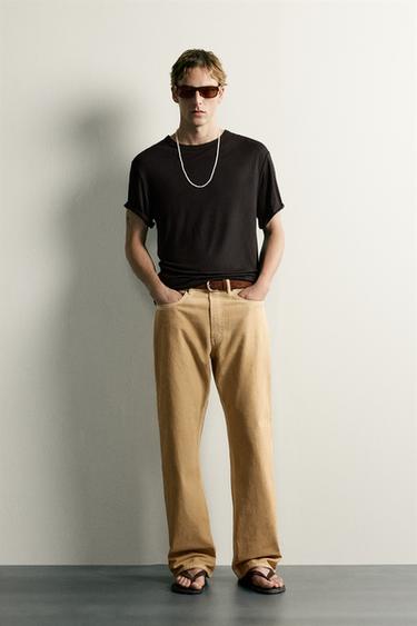 JEANS LOOSE FIT LAVADO IRREGULAR - Ocre de Zara