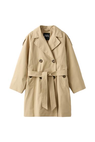 Front view of a beige coat with belt and side pockets