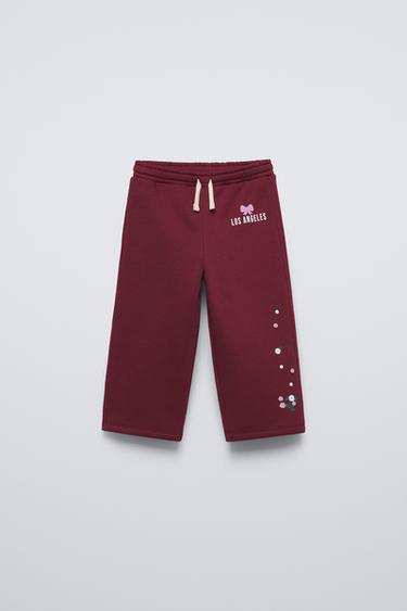 PANTALÓN WIDE LEG RELIEVE - Burgundy de Zara