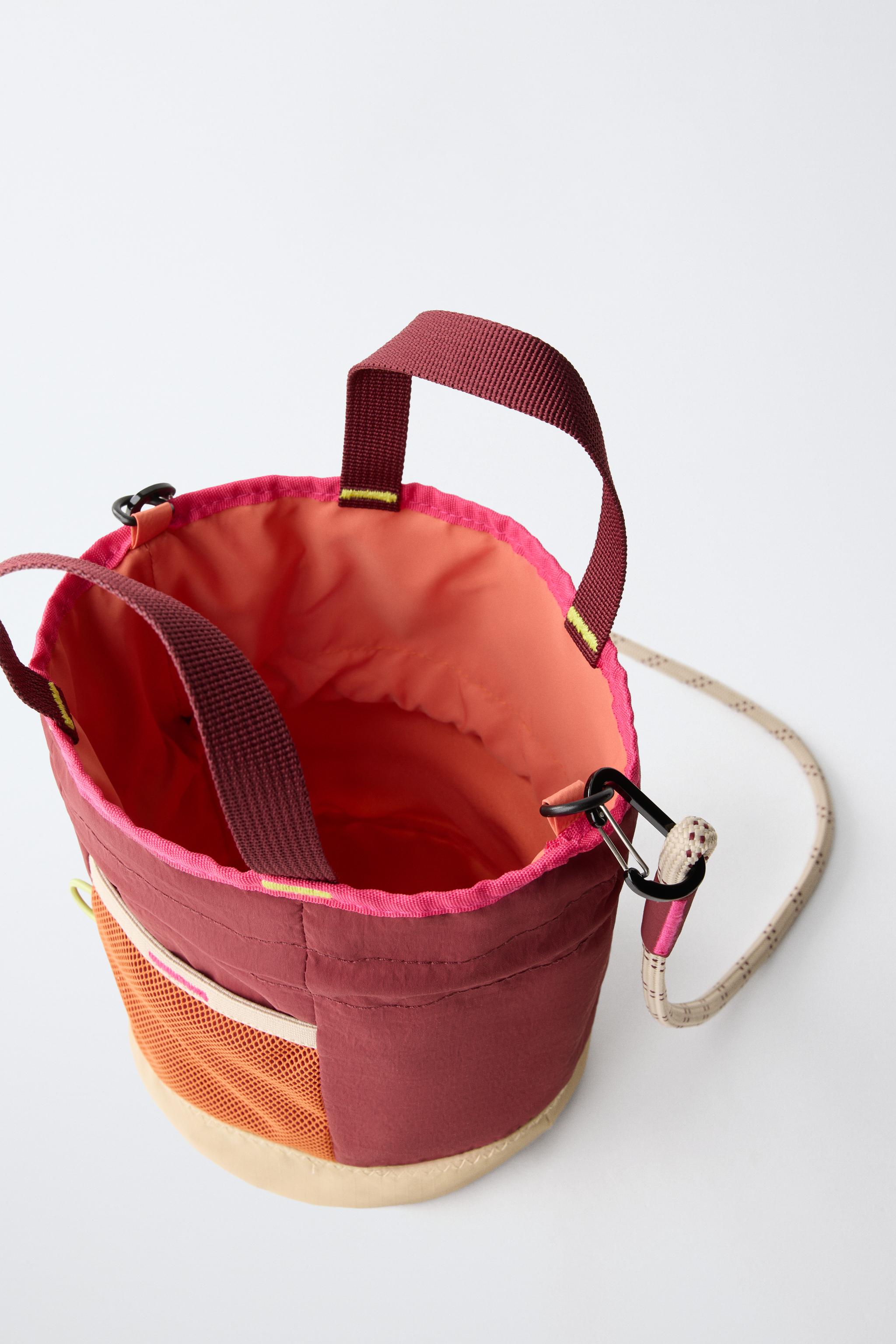MULTICOLOR TECHNICAL BUCKET BAG