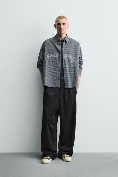 PANTALÓN JOGGER JACQUARD RAYAS - Negro de Zara