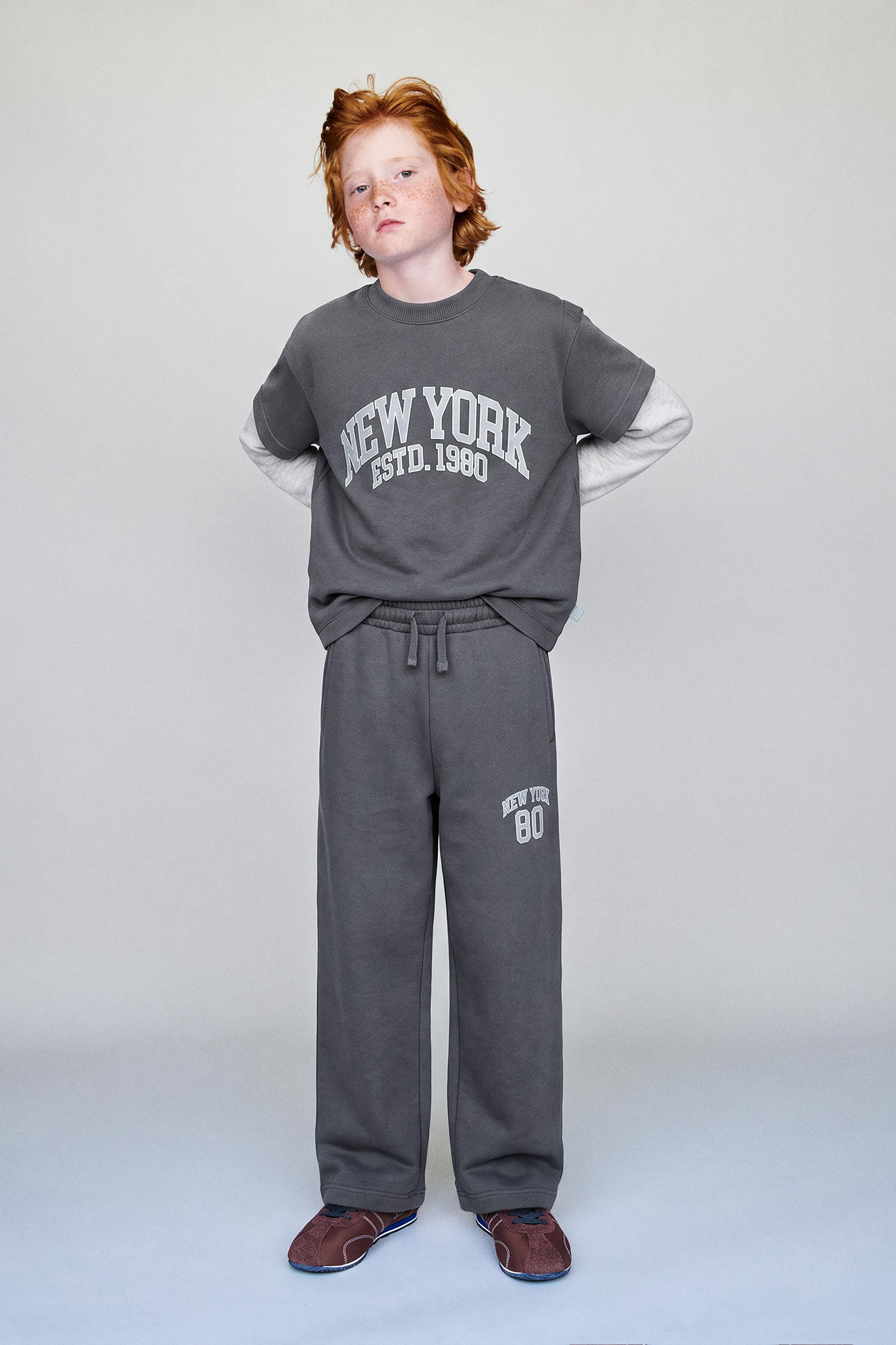 DOUBLE SLEEVE TEXT SWEATSHIRT