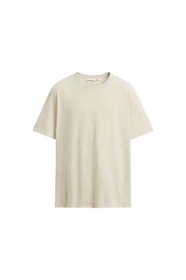 T-SHIRT MIT UNREGELMÄSSIGEN ABSCHLÜSSEN - Beige von Zara