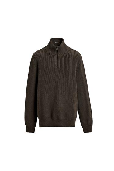 Front view of a chocolate pearl knit jumper, zip-up funnel neck, long sleeves and ribbed trims.