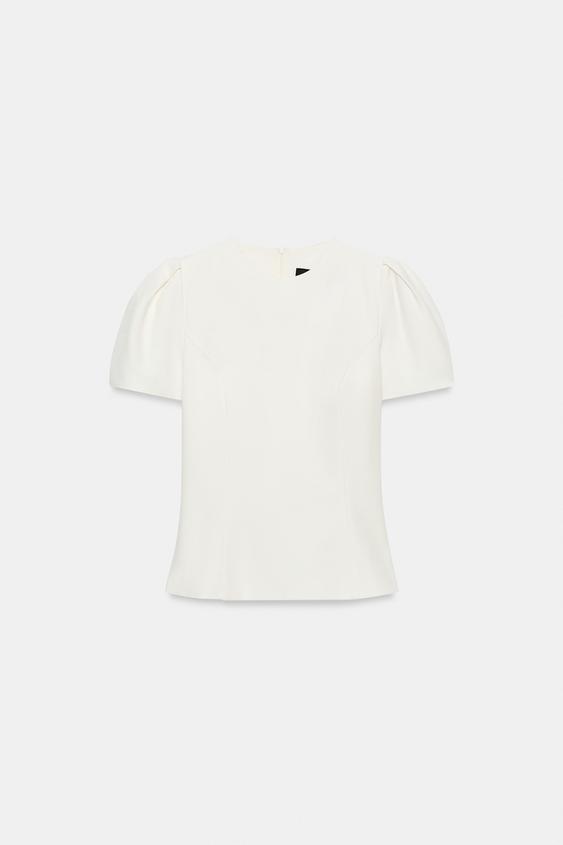 TOP MANGA ABULLONADA - Blanco roto de Zara - Imagen 0