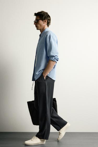 PANTALÓN RELAXED FIT 100% LYOCELL - Negro de Zara