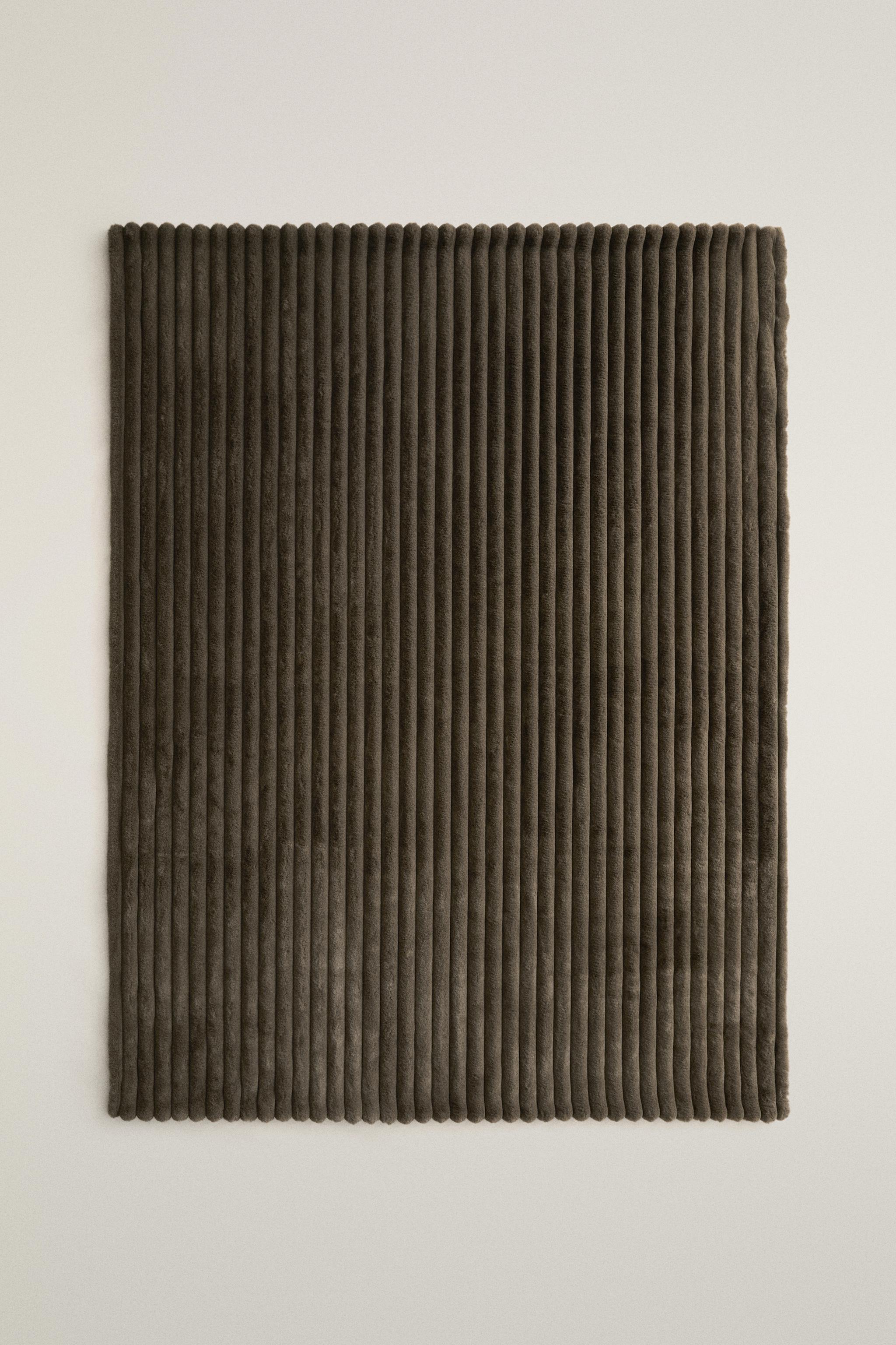 TUBULAR EMBOSSED FUR BLANKET