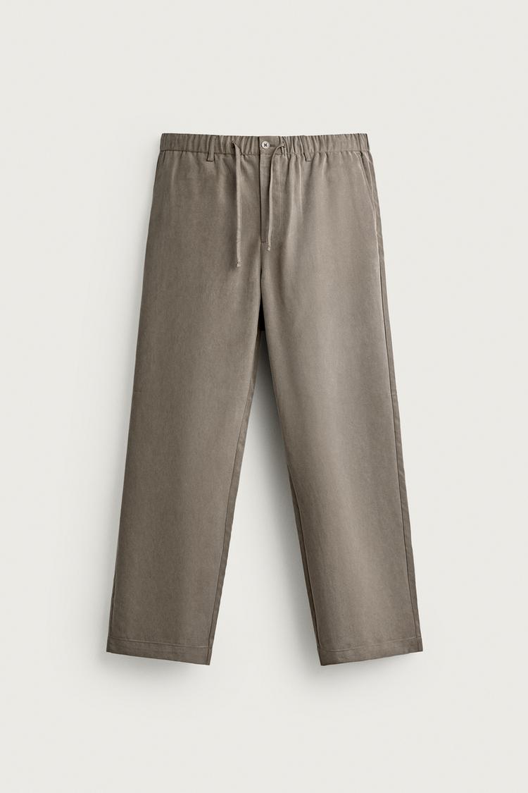 RELAXED FIT FLOWING TROUSERS