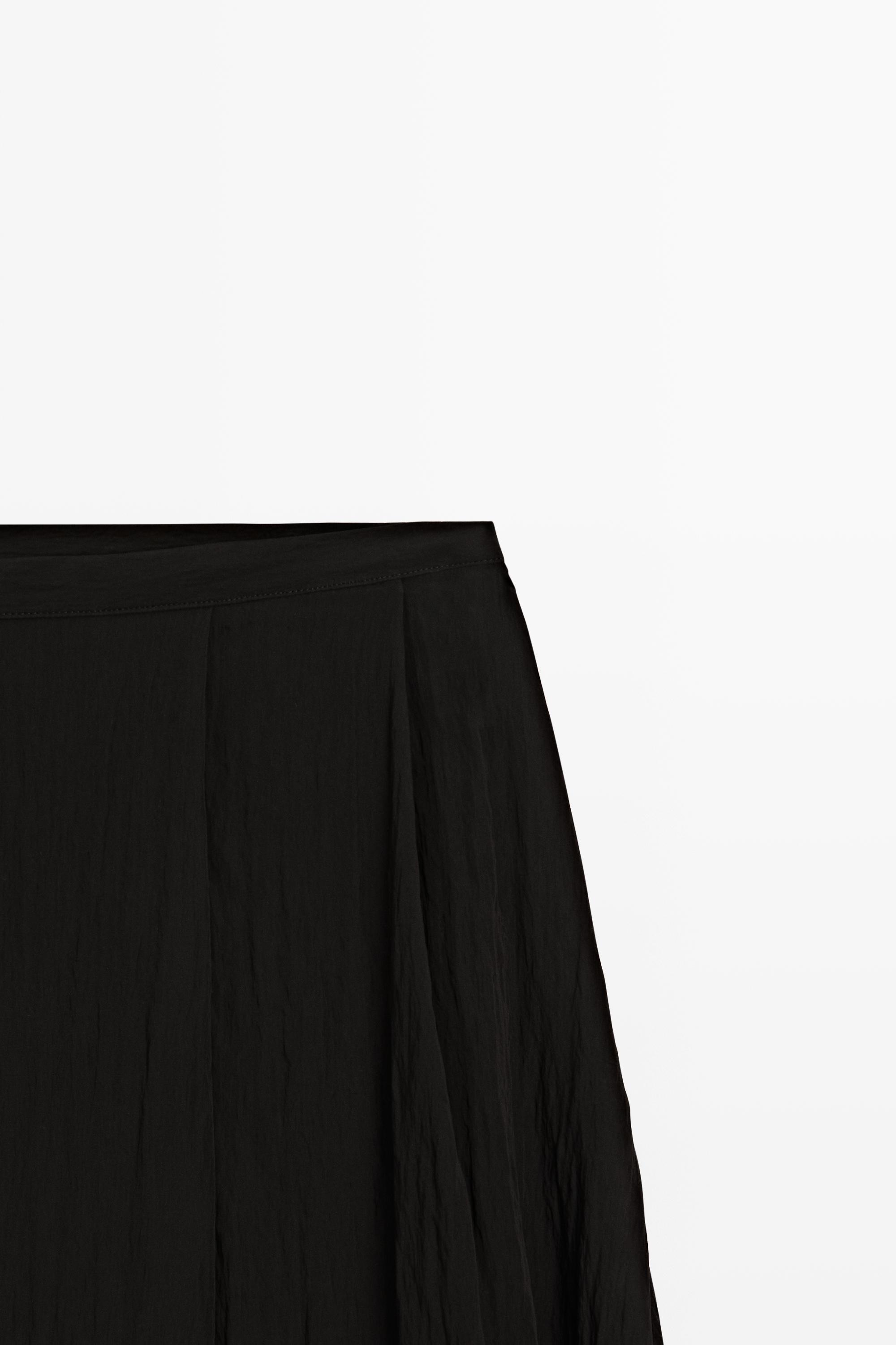 Jupe midi fluide à panneaux asymétriques