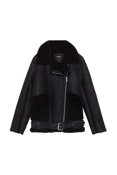 Front view of a black jacket with a side zip, faux leather pockets, and a buckle belt.