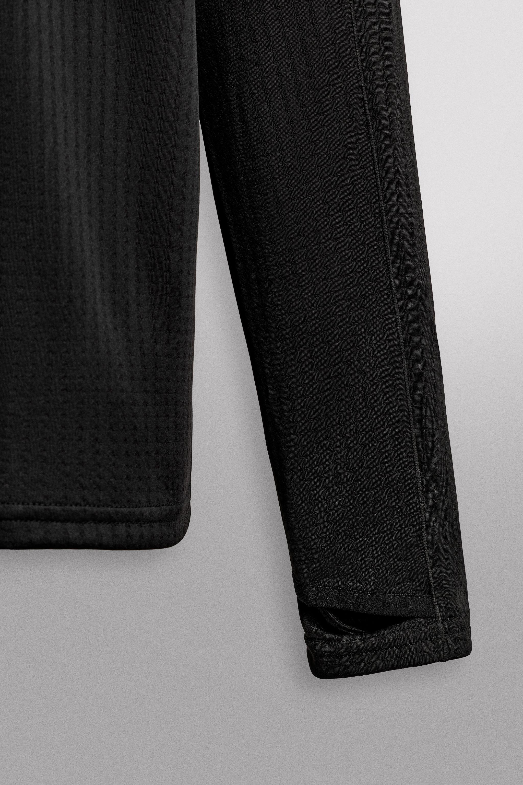 COMBINATION POCKET QUARTER-ZIP SWEATSHIRT