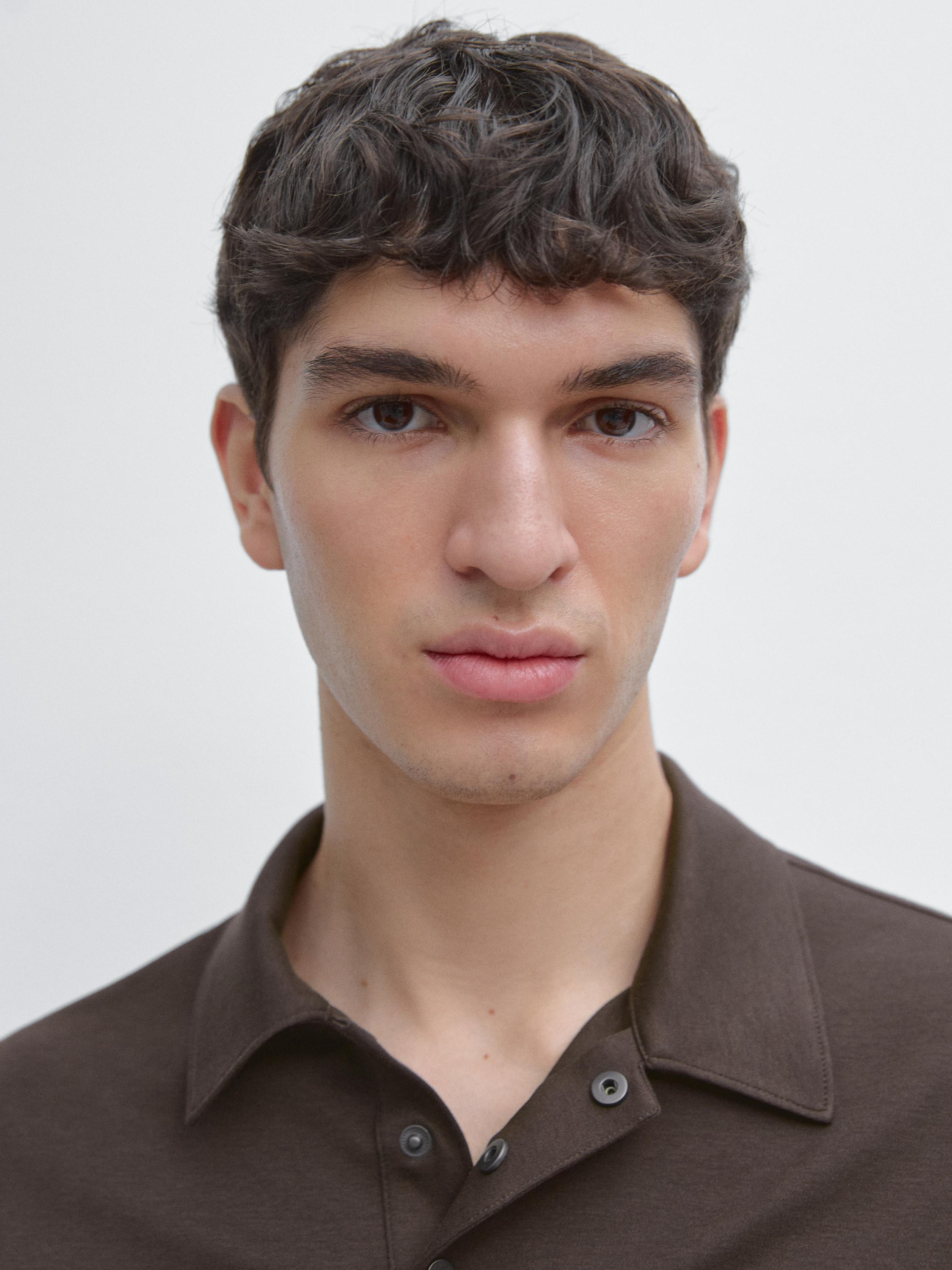 Short sleeve cotton blend knit polo shirt