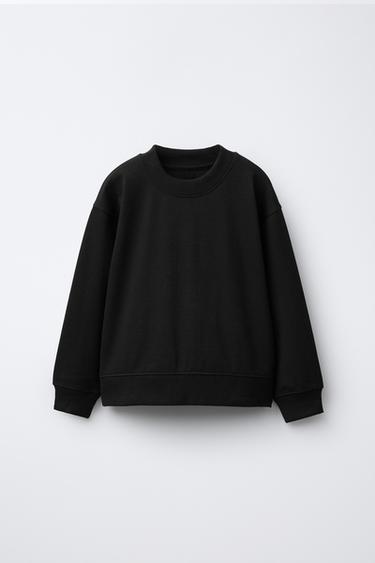 ENSEMBLE SWEAT ET PANTALON EN MOLLETON À JAMBES LARGES UNIE - Noir de Zara - Image 1