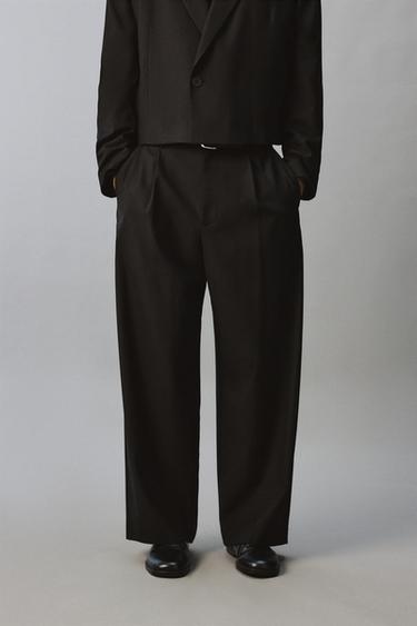RELAXED FIT SUIT TROUSERS WITH PLEATS - Black by Zara