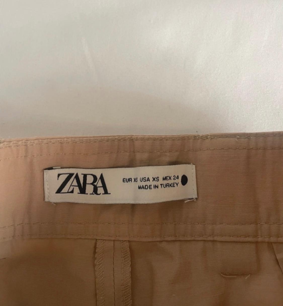 PANTALÓN ANCHO ACAMPANADO BEIGE - Image 4