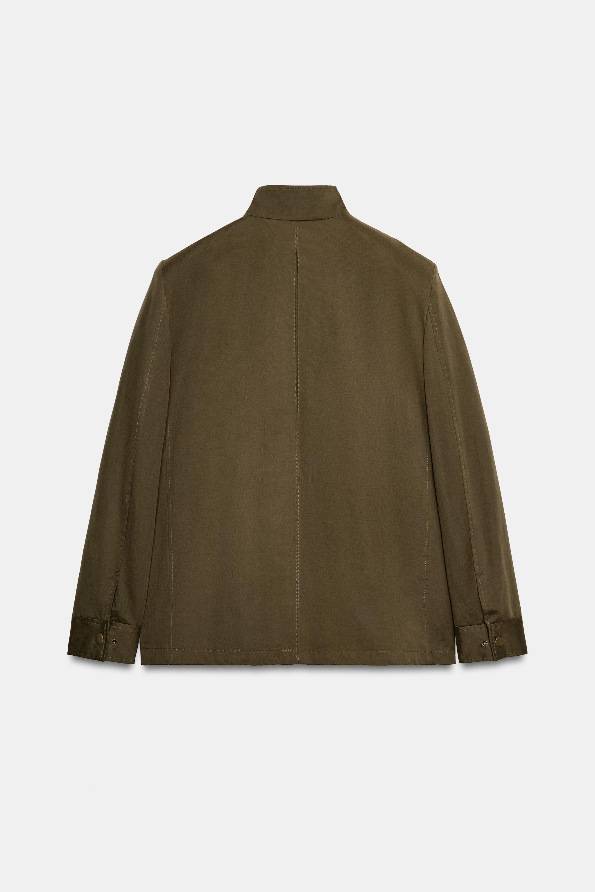 VESTE À ÉPAULETTES ET POCHES