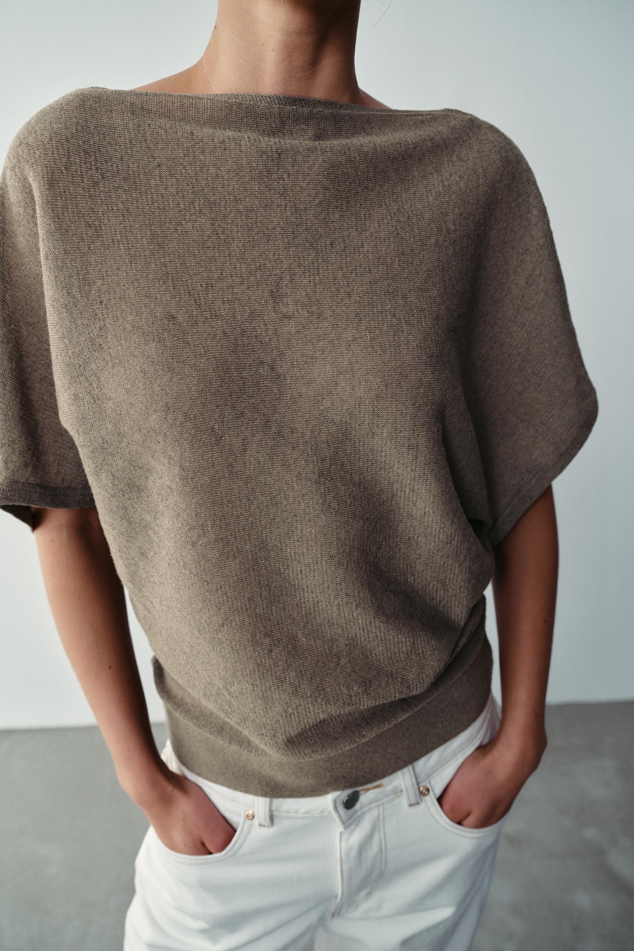 TOP EN MAILLE À DÉCOLLETÉ FLUIDE DANS LE DOS