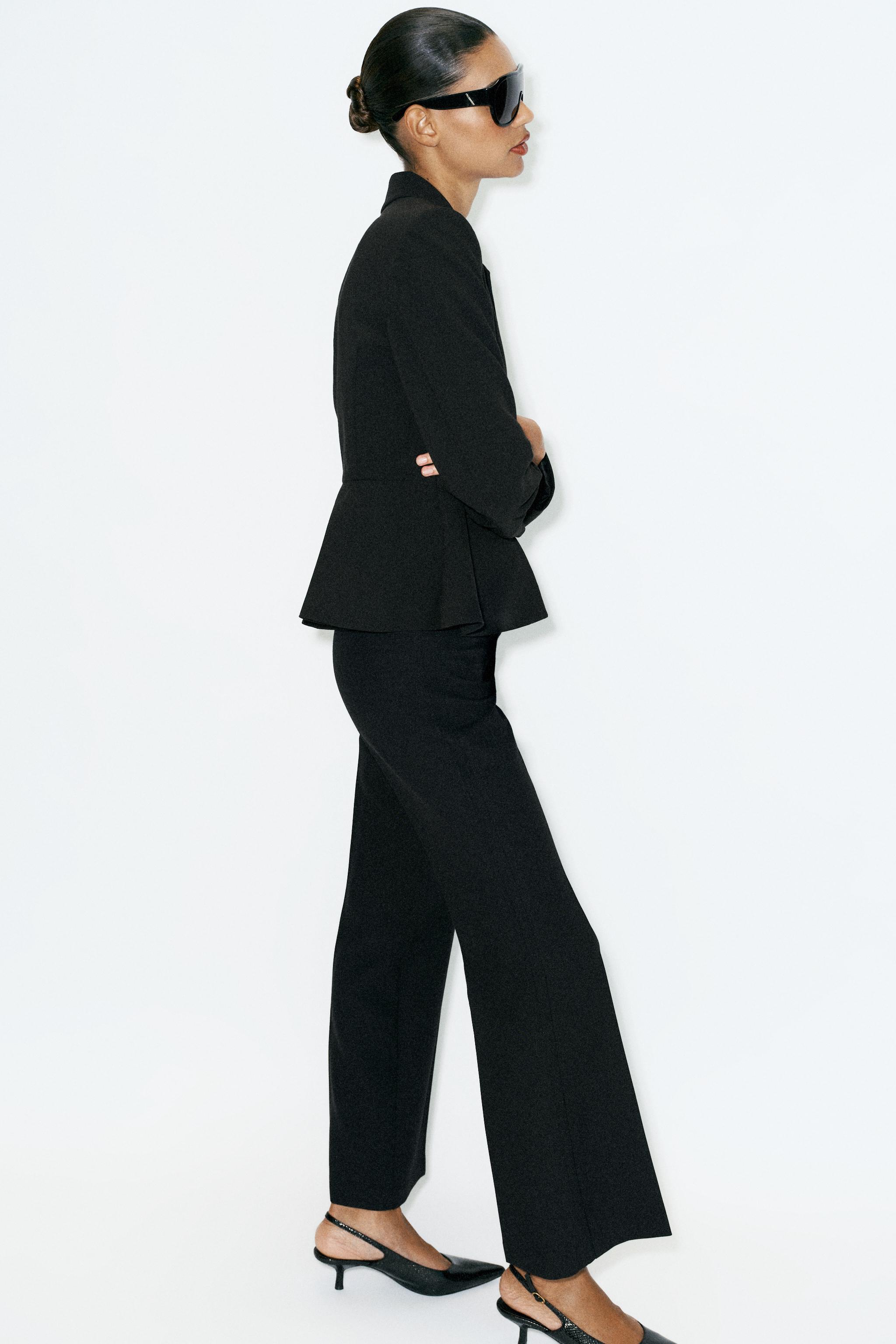 VESTE PEPLUM À ÉPAULETTES
