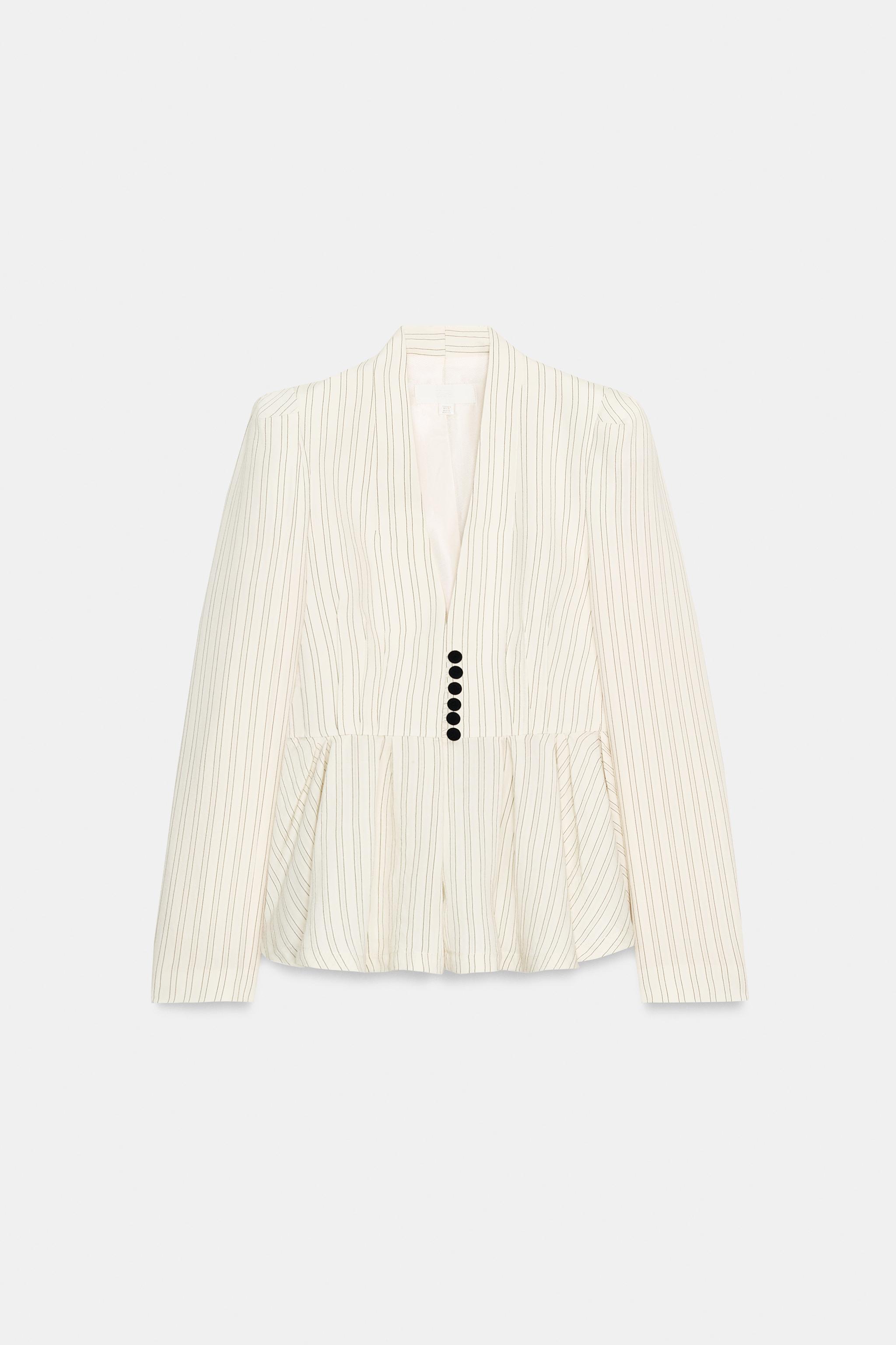 VESTE PEPLUM À RAYURES