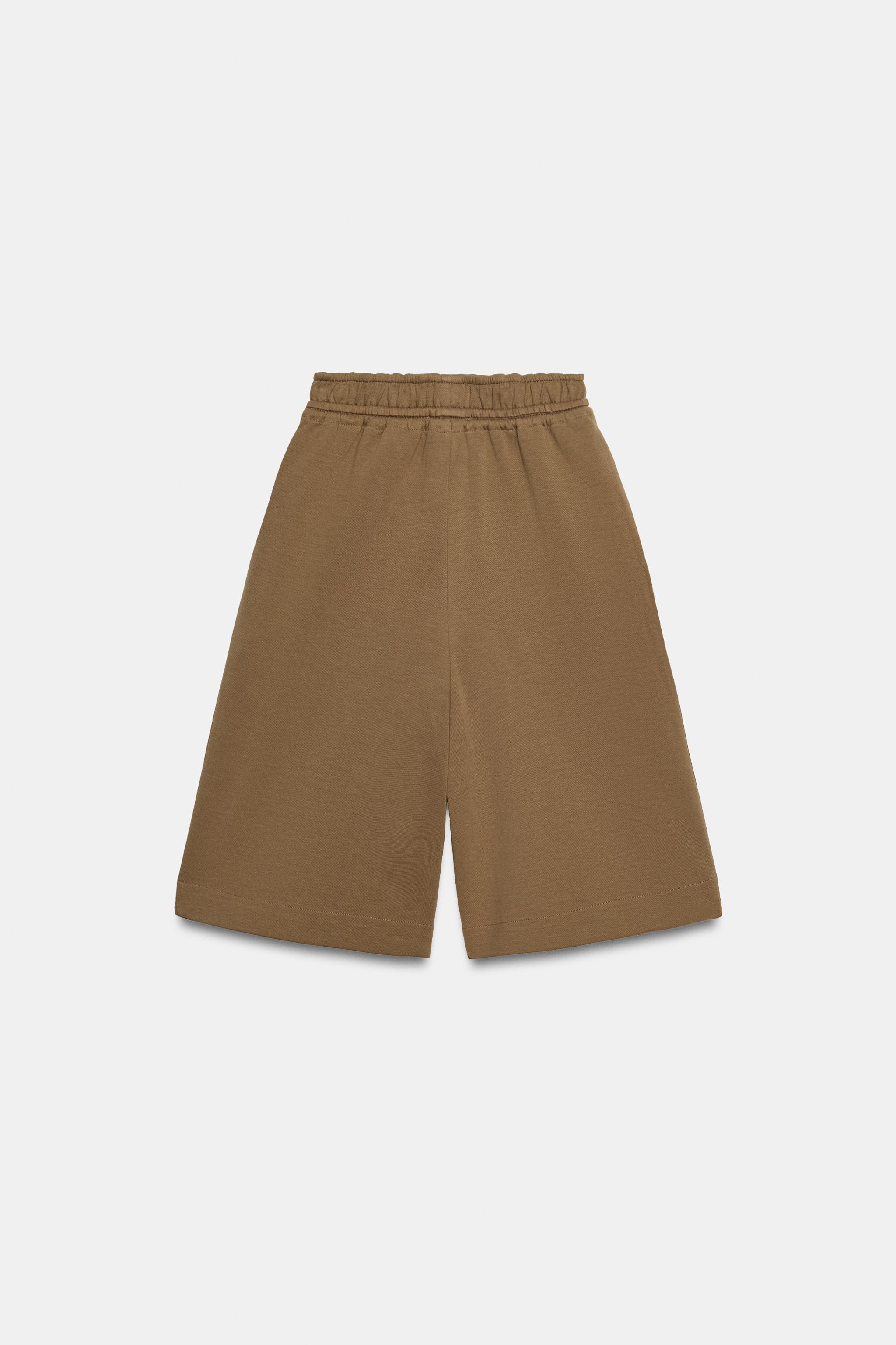 PLEATED BERMUDA SHORTS