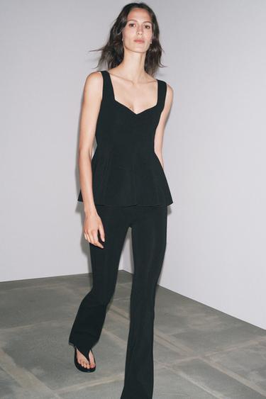 ペプラム ストレッチ トップスブラックZaraのペプラム ストレッチ トップス - ブラック