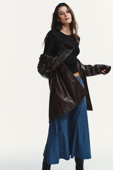 FALDILLA MIDI DE QUADRES AMB PLECS - Blaus de Zara
