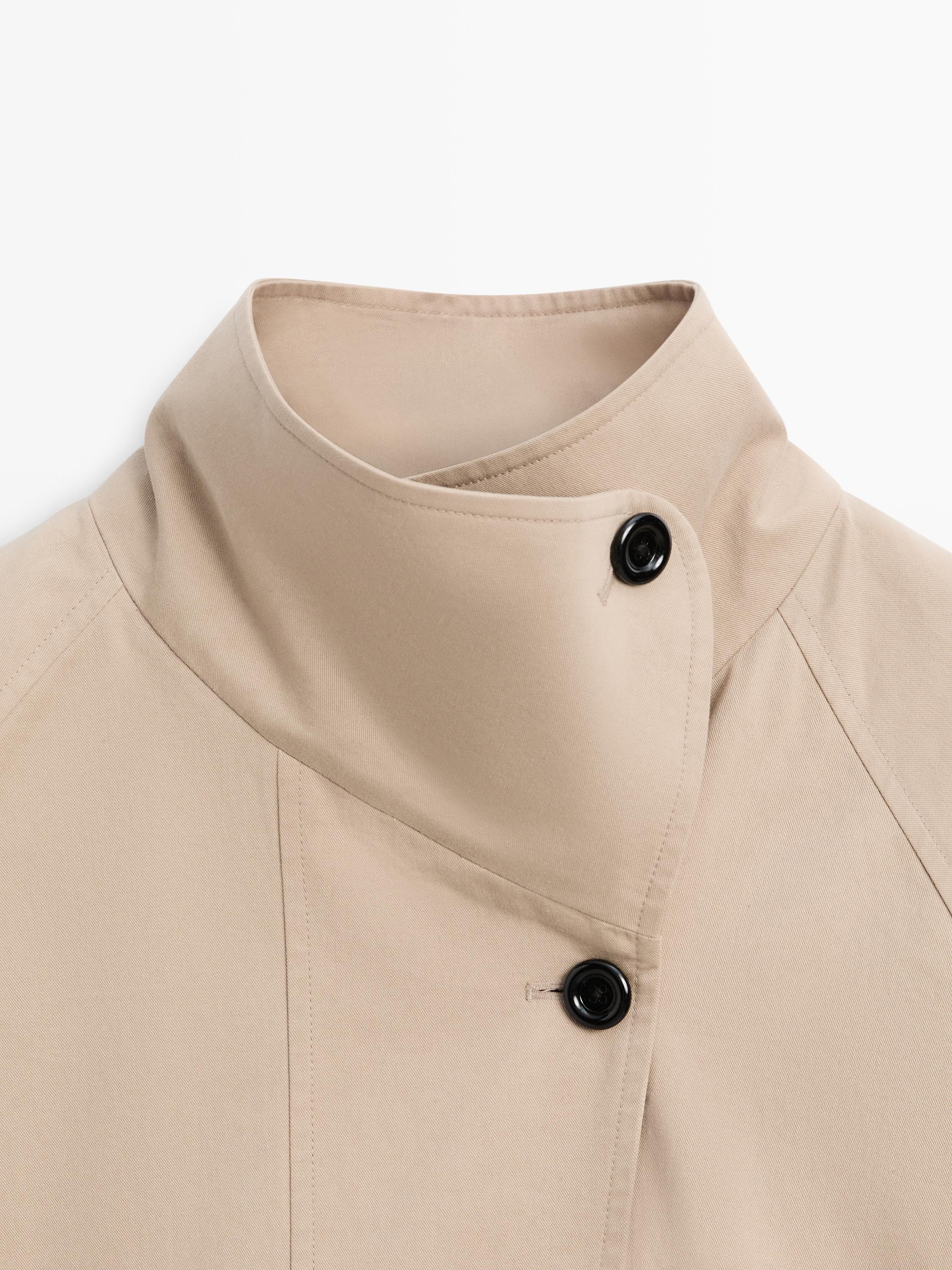 Long 100% cotton trench coat with side fastening