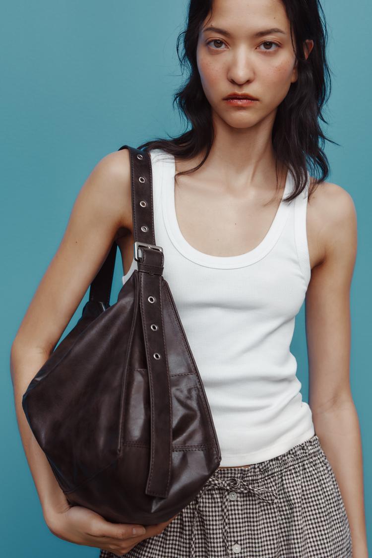 SOFT MAXI BUCKET BAG WITH METAL EYELETS