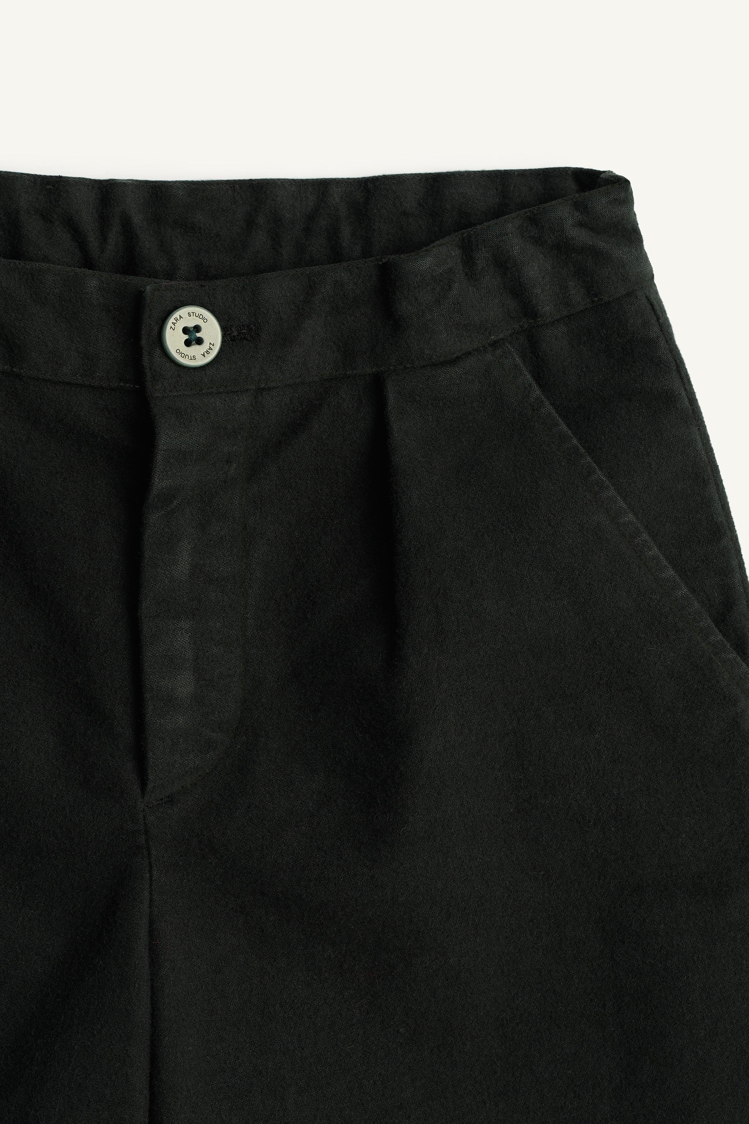 LIMITED EDITION VELVET PLEATED BERMUDA SHORTS