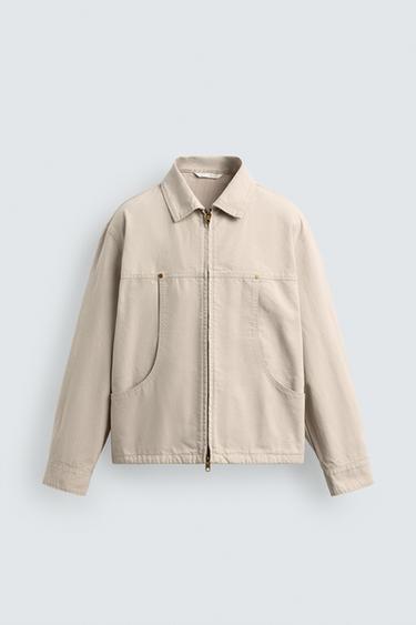 جاكيت فيت مريح بجيوب - أبيض مكسور الخاص بـ Zara