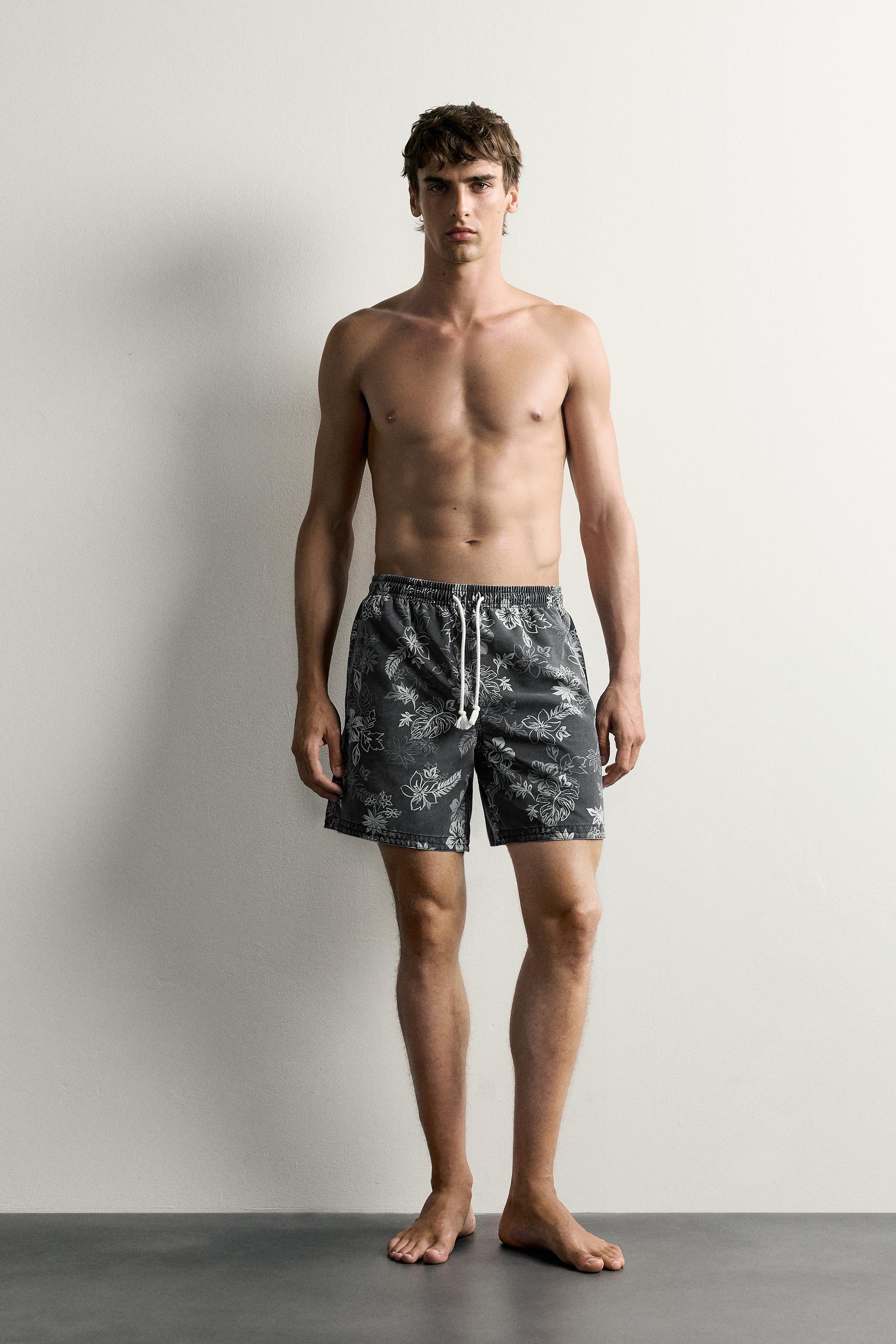 FLORAL PRINT LONGLINE SWIM SHORTS