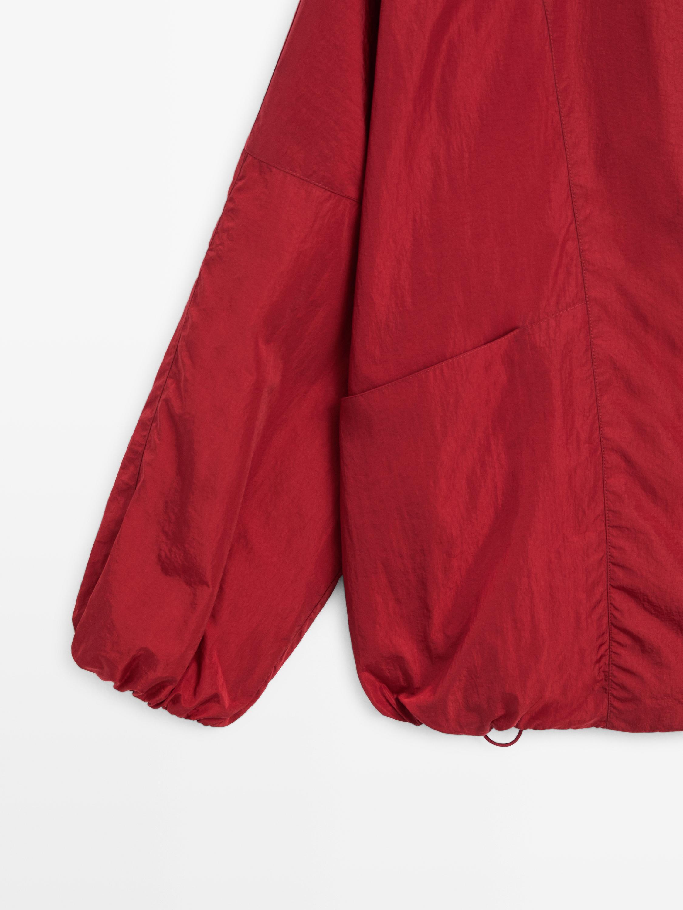 Veste bomber bouffante à col montant