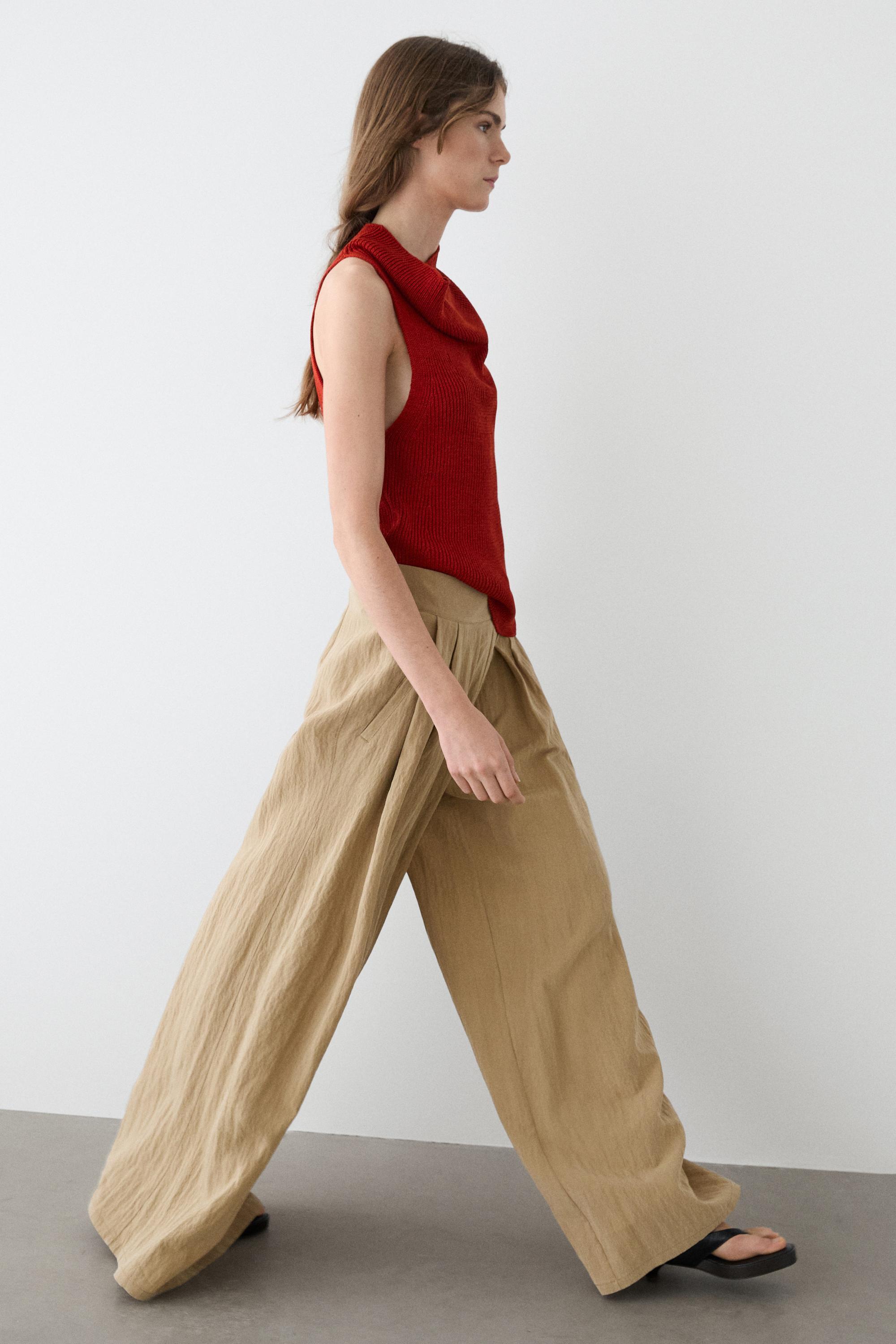 Palazzo trousers with box pleats