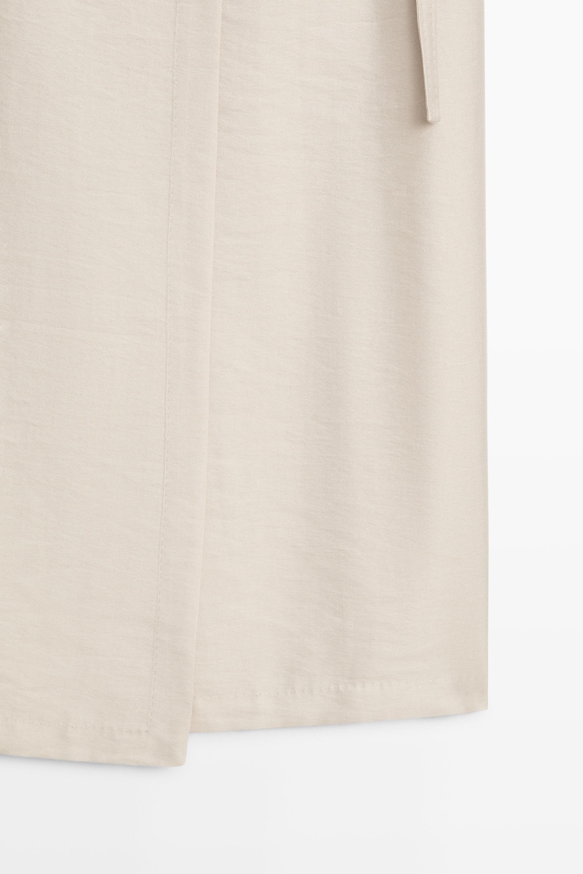 Fluid pocket-detail skirt - STUDIO